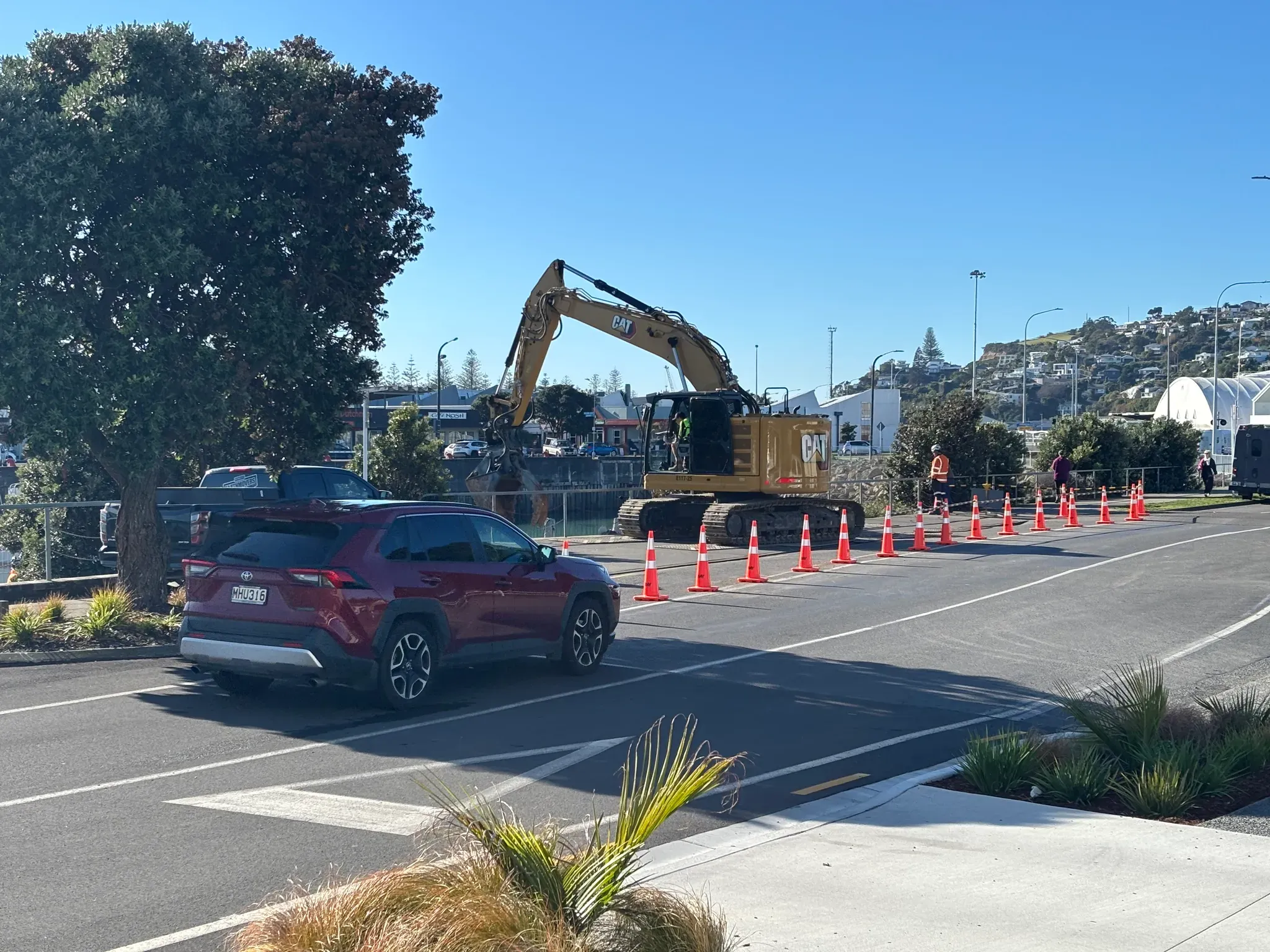 Temporary traffic management around an excavator on a road project